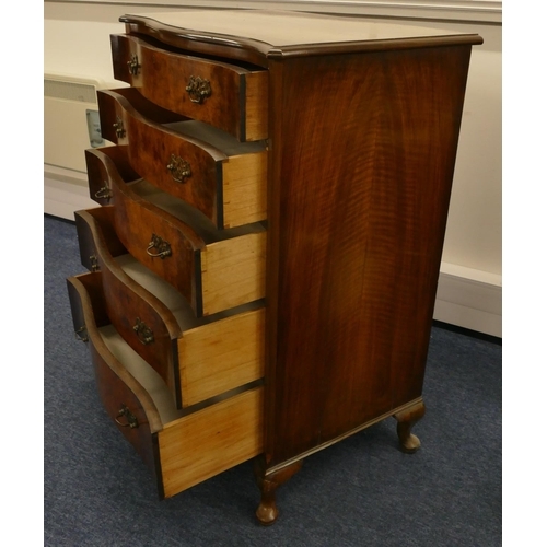 1157 - A walnut and mahogany serpentine fronted chest of drawers with 5 long graduated drawers and drop bra... 