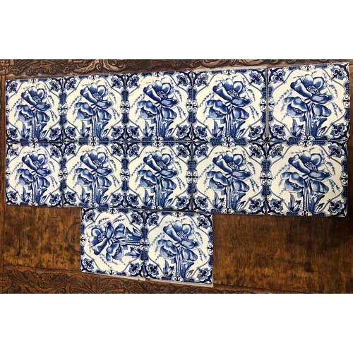 6153 - 12 blue and white floral patterned tiles made by Cleveland.