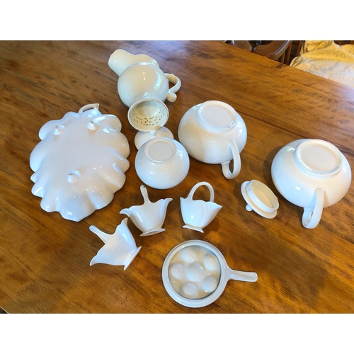 6161 - A quantity of white china, including 2 teapots, a leaf shaped dish etc. (9)