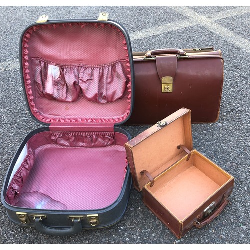 6177 - A brown leather briefcase with brass lock, zipped side compartment, leather interior and small brown... 