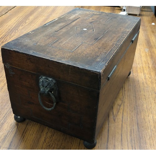 6178 - A wooden tea caddy with hinged lid 3 compartments  to interior.