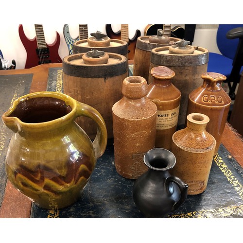 6185 - 4 miniature wooden barrels/flasks with screw stoppers, 2 jugs and various ceramic bottles.