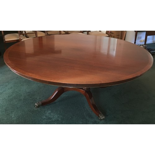 6188 - A large good quality reproduction mahogany circular 12 seat dining table on pedestal base with 4 spl... 