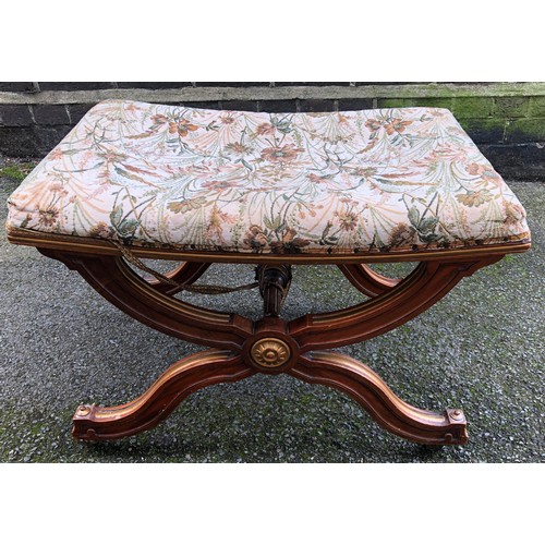 6149 - A walnut stool with floral overstuffed seat, on castors, 62cm wide, 42cm deep, 43cm high.