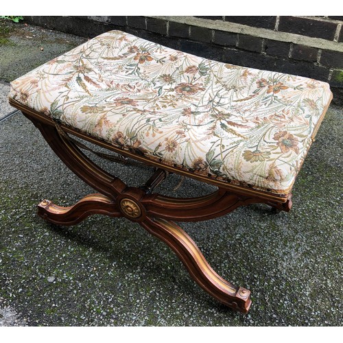 6149 - A walnut stool with floral overstuffed seat, on castors, 62cm wide, 42cm deep, 43cm high.