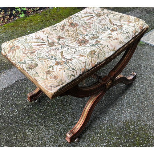 6149 - A walnut stool with floral overstuffed seat, on castors, 62cm wide, 42cm deep, 43cm high.