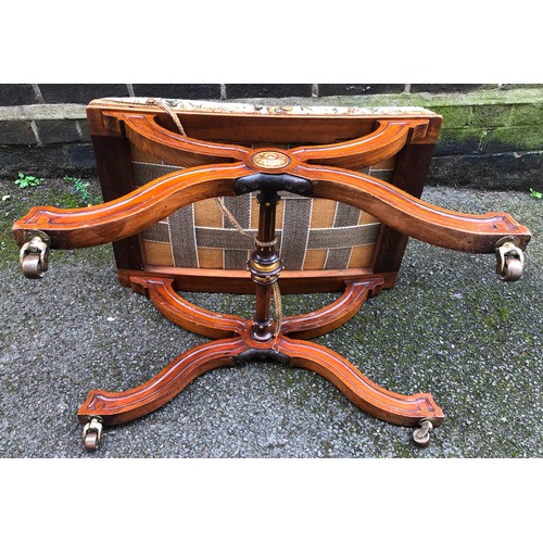 6149 - A walnut stool with floral overstuffed seat, on castors, 62cm wide, 42cm deep, 43cm high.