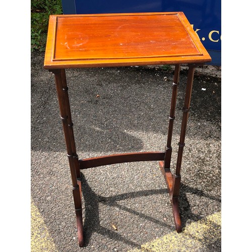 6194 - A small mahogany table 66cm high, 39 cm wide, 30cm deep.