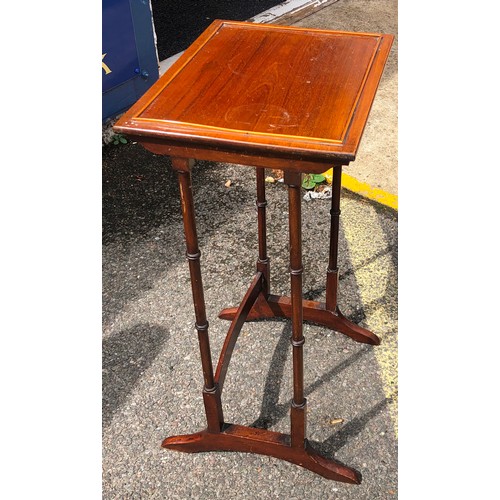 6194 - A small mahogany table 66cm high, 39 cm wide, 30cm deep.