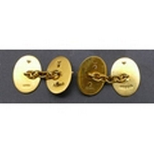 717 - A pair of 9ct gold Royal Marine oval cufflinks with raised crests, 13.6 grams (engraved initials) (b... 