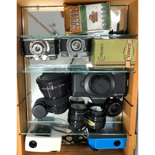 7105 - A small display cabinet containing 2 Coronet midget cameras, 2 micro cameras and a small Pentax Auto... 