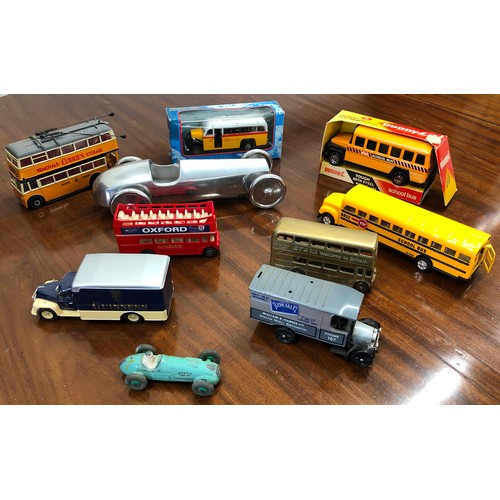 7104 - Various toy buses, tram, truck and racing car.