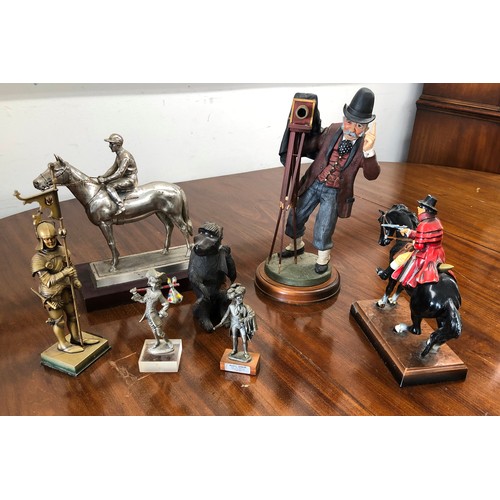 7101 - Various figures including figure of a racing horse and rider, a highway man on horseback etc. (7)