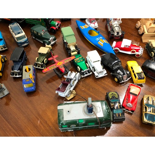 7100 - A large quantity of model cars including Rolls Royce Silver Ghost, Dinky Roving Eye van, Chitty Chit... 