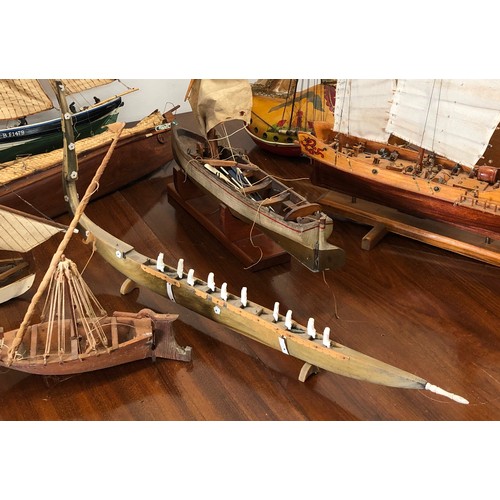 7099 - 8 various model boats including a Dutch clog boat with lamp bulb fitting.