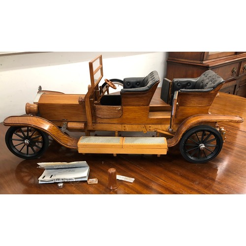 7096 - A wooden model of a Rolls-Royce Silver Ghost, 82cm long.