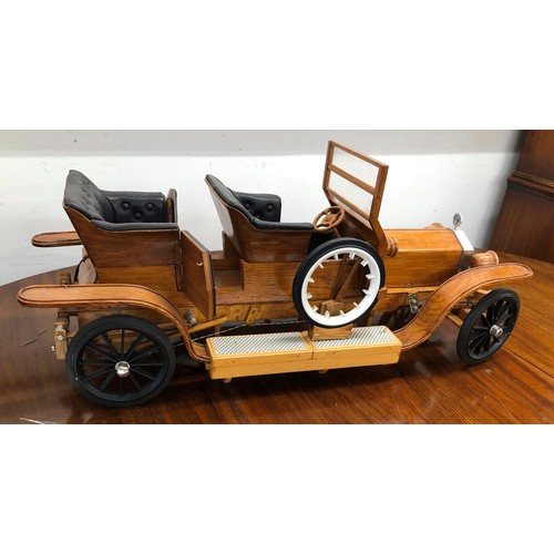 7096 - A wooden model of a Rolls-Royce Silver Ghost, 82cm long.