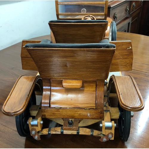 7096 - A wooden model of a Rolls-Royce Silver Ghost, 82cm long.