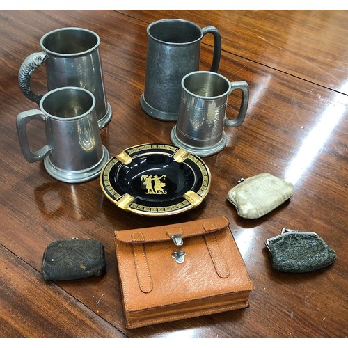 7093 - 4 pewter tankards, a miniature leather satchel containing to packs of cards and score cards, 3 minia... 