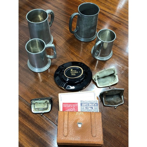 7093 - 4 pewter tankards, a miniature leather satchel containing to packs of cards and score cards, 3 minia... 