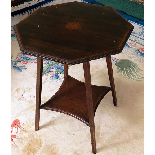 7079 - A small occasional table with hexagonal top and marquetry to centre, shelf below, 70cm high, top 54.... 