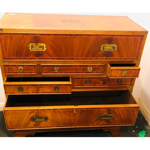 7074 - A reproduction campaign secretaire chest of drawers with fall front enclosing 4 small drawers and st... 