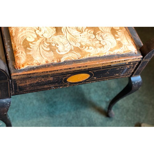 7073 - A piano stool with turned handles, hinged top with fabric covered seat enclosing storage section, 64... 