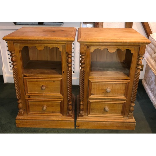 7068 - A pair of pine bedside cabinets each with open shelf and 2 drawers below, knob handles, 76.5cm high,... 