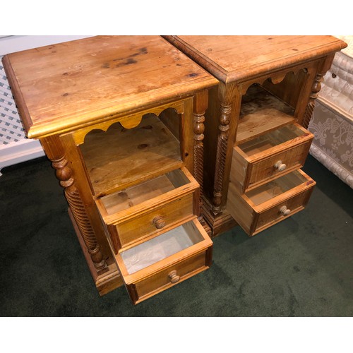 7068 - A pair of pine bedside cabinets each with open shelf and 2 drawers below, knob handles, 76.5cm high,... 