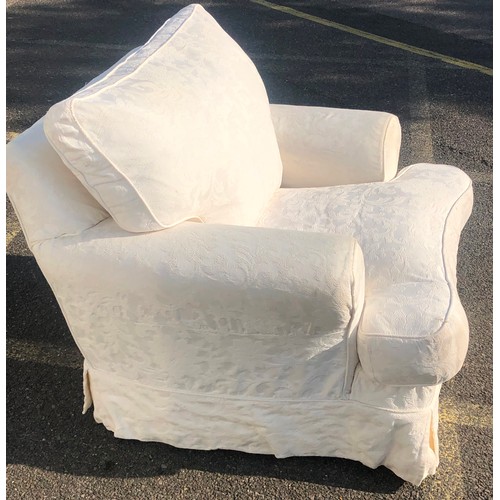 7017 - A modern armchair in Multi-York style with white patterned fabric, feathered base and back cushions,... 