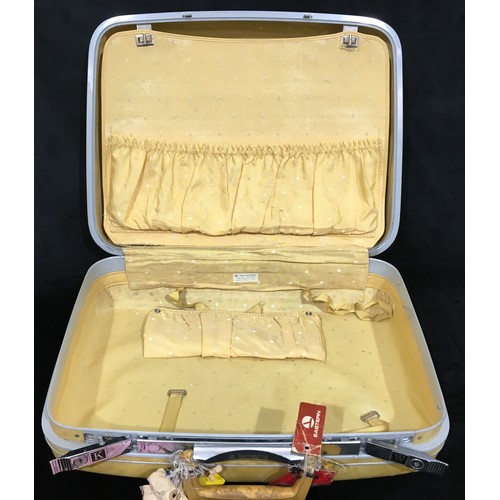 7108 - A vintage mustard yellow Samsonite Silhouette overnight hard suitcase (no key), 53cm wide, 42cm high... 