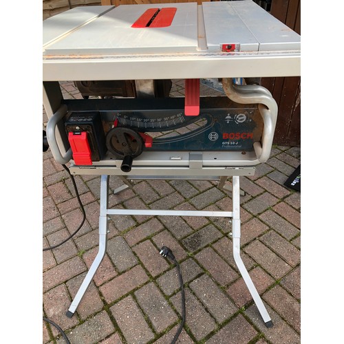 7122 - A Bosch GTS 10 J Professional table saw with stand, 93cm high overall