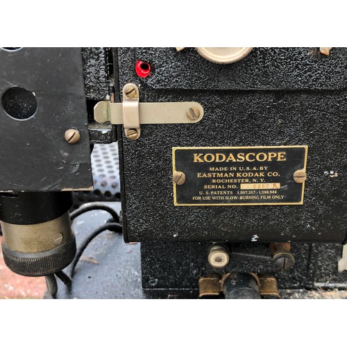 7126 - A Pathescope, 32cm high, 2 Kodascopes, 46.5cm high overall (3)