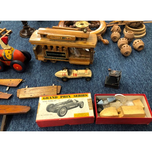 7140 - A quantity of handmade wooden carts, a musical wooden circus railway carriage (working), various spa... 