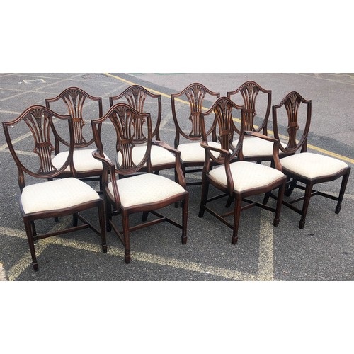 7148 - A set of 8 reproduction mahogany dining chairs with cream drop seats, 2 carvers, 6 singles