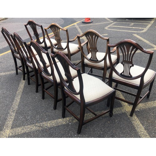 7148 - A set of 8 reproduction mahogany dining chairs with cream drop seats, 2 carvers, 6 singles