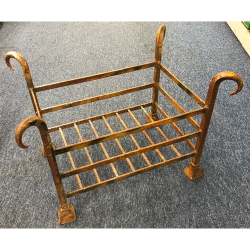 7162 - A wrought iron rectangular fire basket on square feet, 61cm wide. 43.5cm deep, 43.5cm high