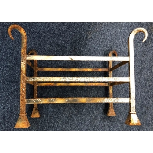 7162 - A wrought iron rectangular fire basket on square feet, 61cm wide. 43.5cm deep, 43.5cm high