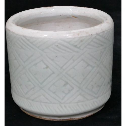 102 - A Chinese celadon round brush pot, 11cm high