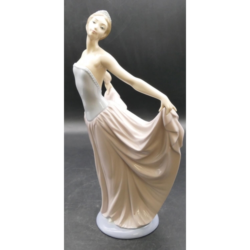 11 - A Lladro figure of a lady dancing, 31cm high