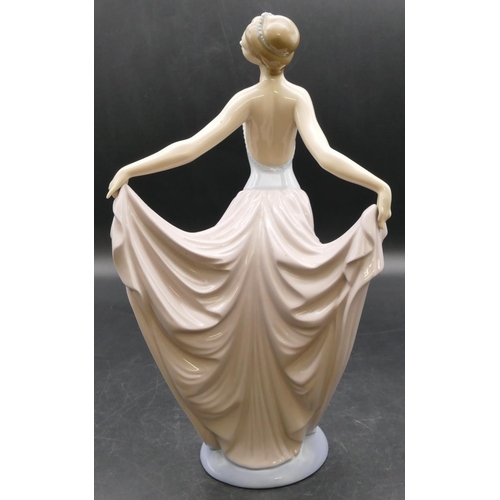 11 - A Lladro figure of a lady dancing, 31cm high