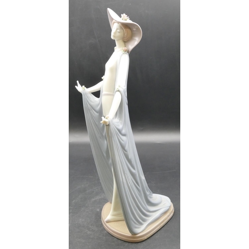 13 - A large Lladro figure of a standing lady in blue cloak, 36cm high