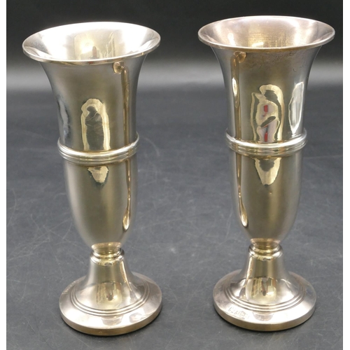 147 - A pair of modern silver round trumpet shaped spill vases on round sweeping bases, Birmingham 1966 (w... 