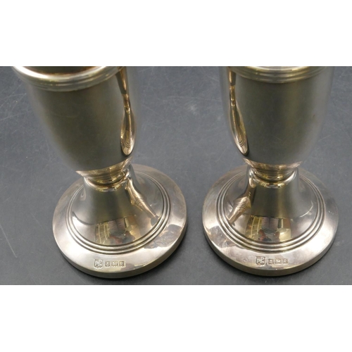 147 - A pair of modern silver round trumpet shaped spill vases on round sweeping bases, Birmingham 1966 (w... 