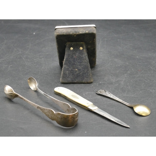 154 - A pair of Sheffield silver sugar tongs, a Birmingham and Mother of Pearl pen knife, a London small s... 