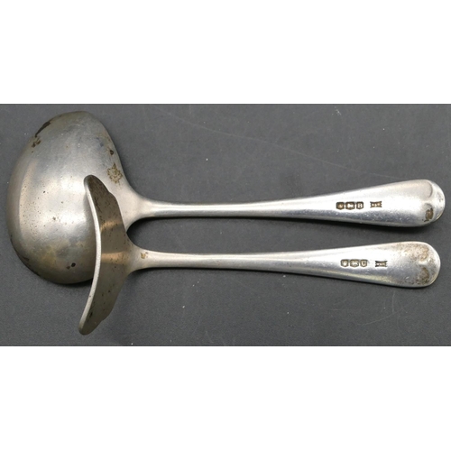 155 - A Birmingham silver child's egg spoon and pusher, maker Walker & Hall, 1.6oz