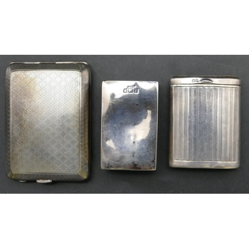 158 - A Birmingham silver matchbox case holder with engine turned decoration with hinged front, an oval Bi... 