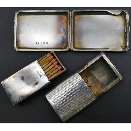 158 - A Birmingham silver matchbox case holder with engine turned decoration with hinged front, an oval Bi... 