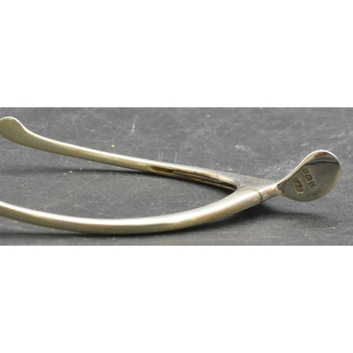 161 - A pair of Birmingham silver wishbone sugar nips, maker's mark L&S, 0.6oz gross