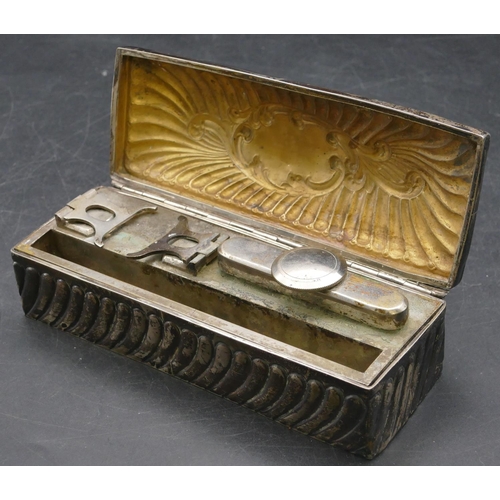 166 - A Birmingham silver rectangular shaped curling tongs box with allover embossed decoration, hinged li... 